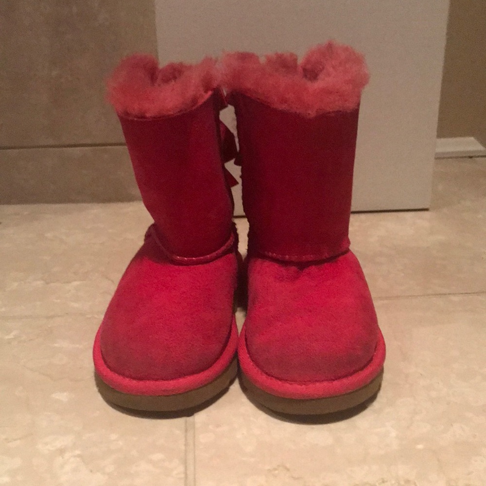 Gently used Hot Pink Girls UGG boots.
